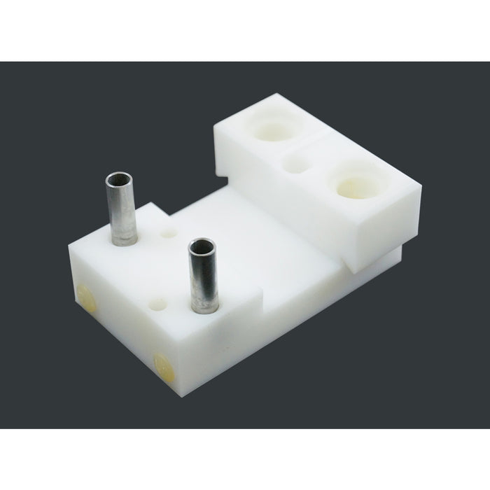 Pulsator block, teflon, used